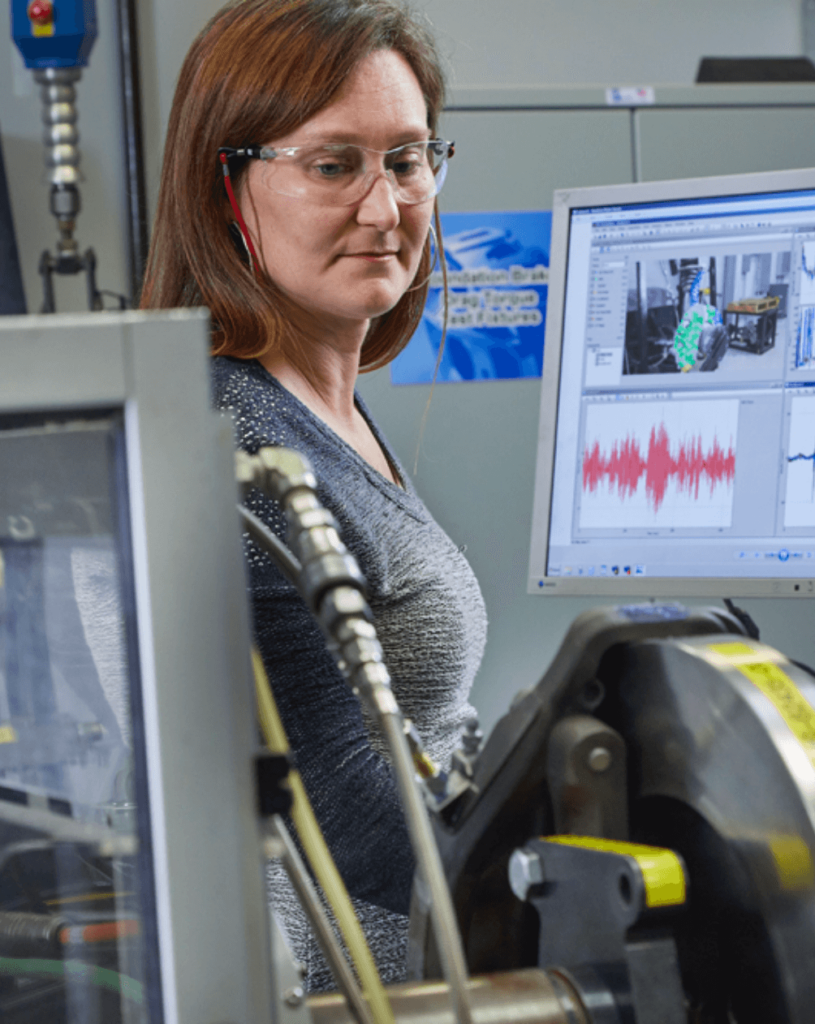 Woman working on brakes